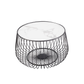 white marble top bound by a black stainless steel frame consisting of vertical metal lines running parallel to one another down to the bottom of the table where they come together in a metal circle underneath the marble